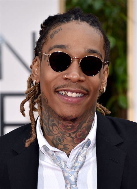 wiz khalifa teeth - 19 Rappers Who Wear Gold Teeth Grills.